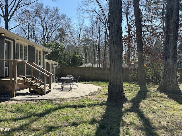 view of yard with a patio area and fence