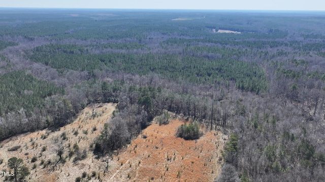 bird's eye view featuring a view of trees