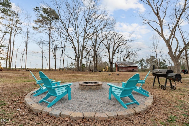 exterior space with a fire pit