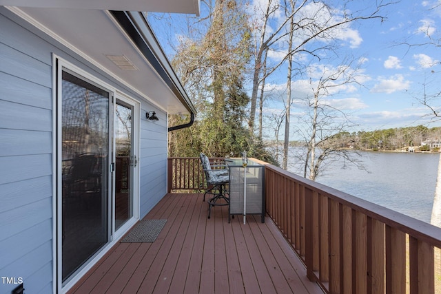 deck featuring a water view