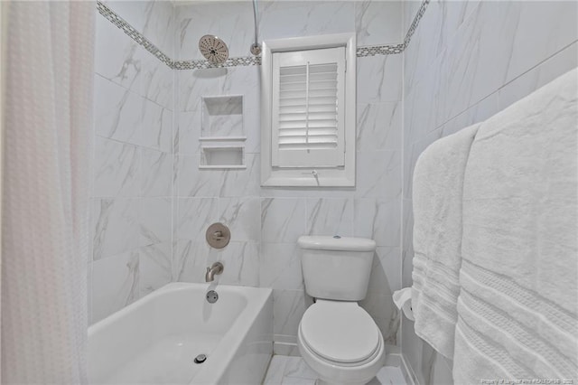 1906 Partridge Dr, Fayetteville, NC 28304 - full bathroom featuring tile walls, shower / tub combo, and toilet