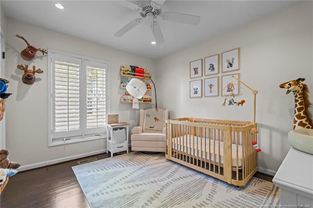 1906 Partridge Dr, Fayetteville, NC 28304 - bedroom with recessed lighting, a nursery area, wood finished floors, and baseboards