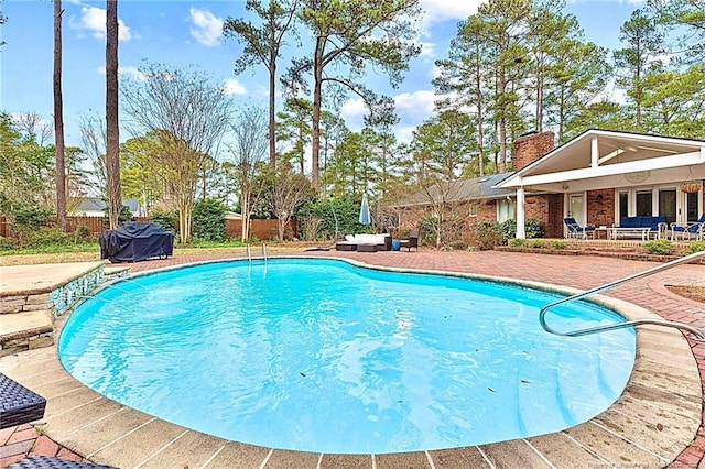 1906 Partridge Dr, Fayetteville, NC 28304 - view of swimming pool featuring a fenced in pool, a patio, and fence