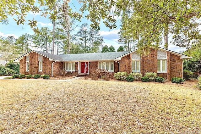 1906 Partridge Dr, Fayetteville, NC 28304 - view of front of property featuring a front lawn and brick siding