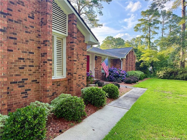 1906 Partridge Dr, Fayetteville, NC 28304 - view of home's exterior featuring brick siding and a yard