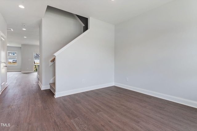 interior space featuring visible vents, dark wood finished floors, recessed lighting, stairway, and baseboards