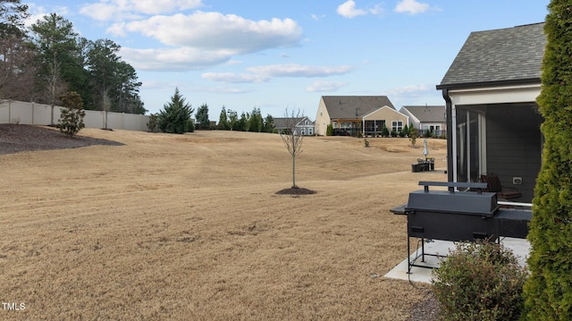 view of yard featuring fence