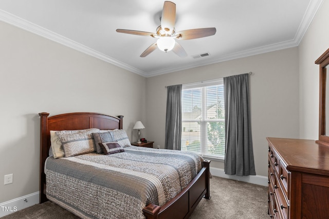 bedroom featuring visible vents, baseboards, light colored carpet, and crown molding