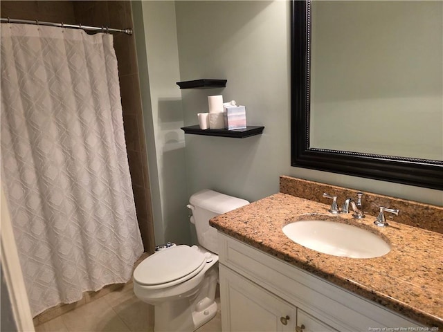 full bath with vanity, a shower with shower curtain, toilet, and tile patterned floors