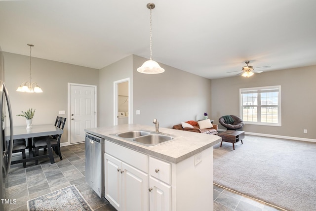 kitchen with white cabinetry, a sink, light countertops, light carpet, and dishwasher