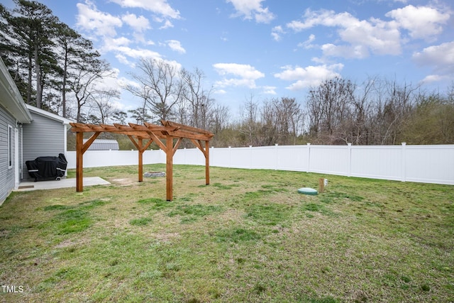 view of yard with a patio area, a pergola, and a fenced backyard