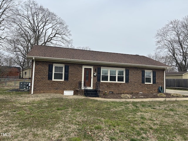 single story home with a front yard, fence, a shingled roof, crawl space, and brick siding