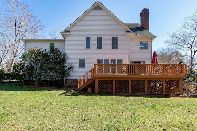 511 Windstream Way, Cary, NC 27518 - rear view of house with a chimney, a deck, a lawn, and stairs