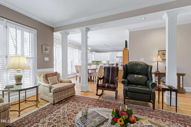 511 Windstream Way, Cary, NC 27518 - living room featuring decorative columns, light wood-type flooring, ornamental molding, and recessed lighting