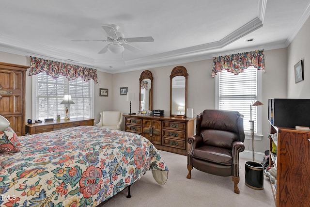 511 Windstream Way, Cary, NC 27518 - carpeted bedroom featuring ornamental molding, a tray ceiling, and ceiling fan