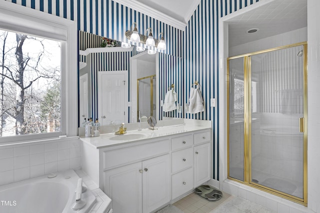 511 Windstream Way, Cary, NC 27518 - bathroom with wallpapered walls, a shower stall, vanity, a garden tub, and tile patterned flooring