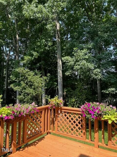 511 Windstream Way, Cary, NC 27518 - wooden terrace featuring view of scattered trees