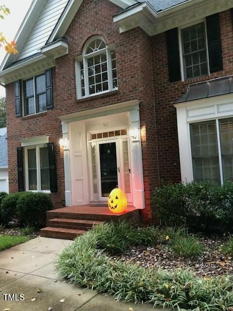 511 Windstream Way, Cary, NC 27518 - entrance to property featuring brick siding