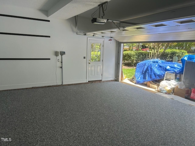 511 Windstream Way, Cary, NC 27518 - garage with a garage door opener and baseboards