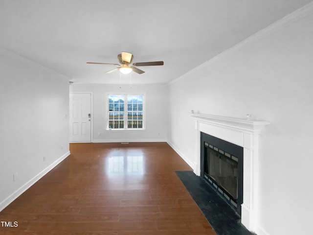 unfurnished living room with a fireplace with flush hearth, a ceiling fan, baseboards, and wood finished floors