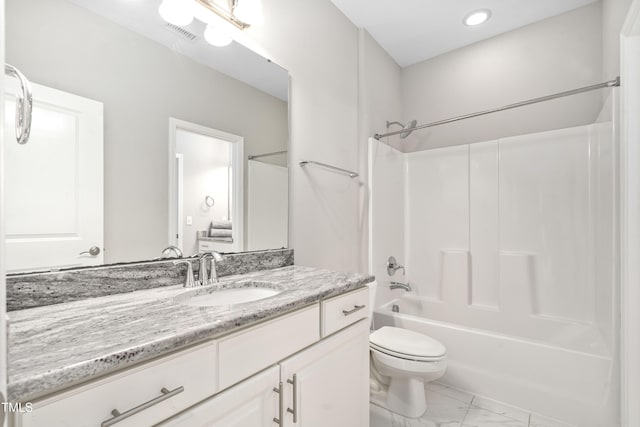 bathroom featuring vanity, visible vents, bathtub / shower combination, toilet, and marble finish floor