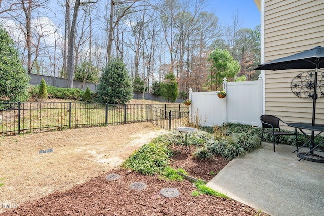 view of yard with a patio area and fence