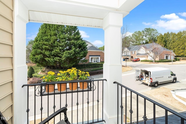 balcony with a porch and a residential view