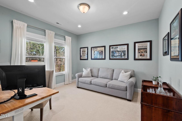 office area with light carpet, visible vents, recessed lighting, and baseboards