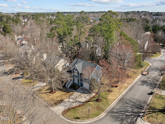 drone / aerial view with a forest view