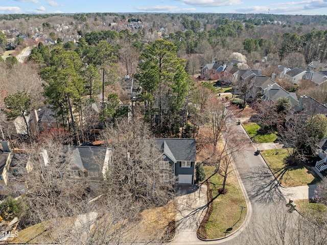 aerial view featuring a forest view