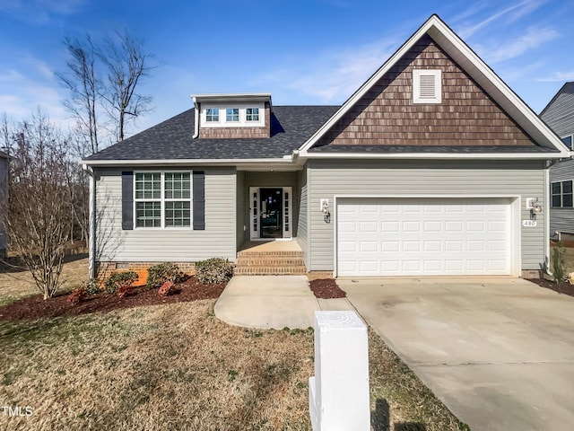 view of front facade featuring crawl space, driveway, an attached garage, and roof with shingles