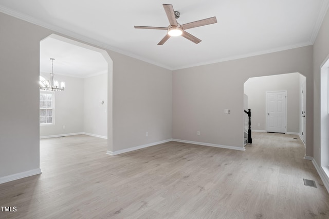 unfurnished room featuring visible vents, arched walkways, light wood-style floors, and ceiling fan with notable chandelier