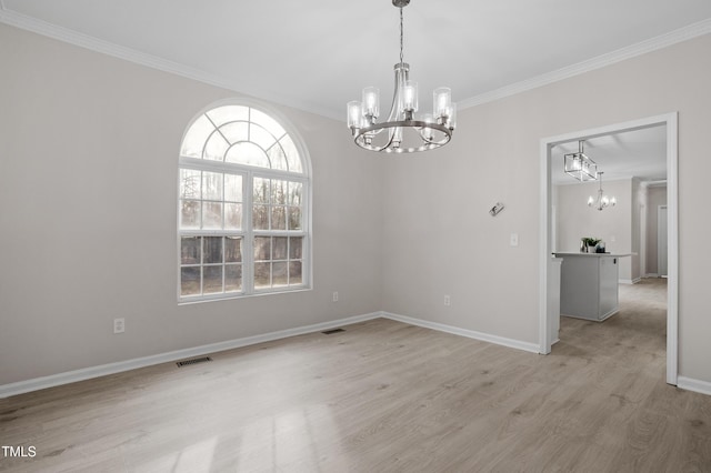 unfurnished dining area with visible vents, a notable chandelier, light wood-style flooring, and crown molding