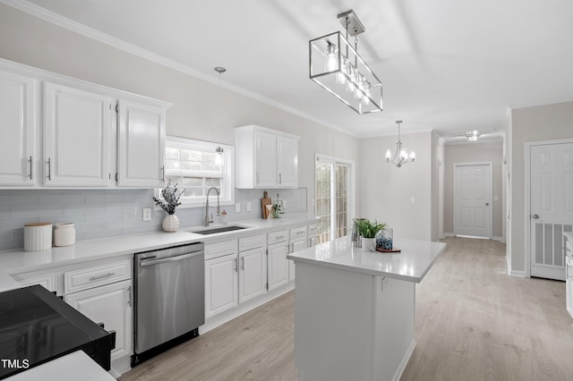 kitchen featuring visible vents, a sink, light wood-style floors, white cabinets, and dishwasher