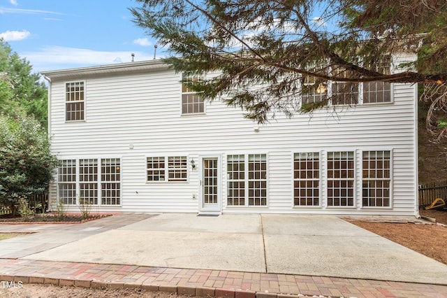 back of property with a patio area