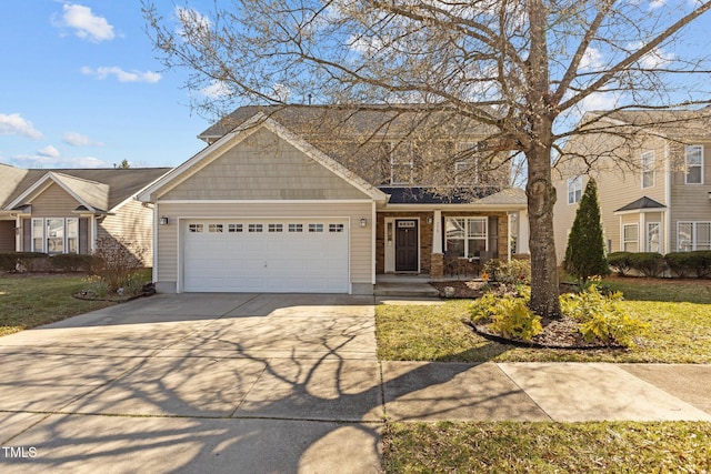 view of front of house featuring a garage and concrete driveway