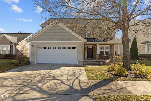 view of front of house with driveway and an attached garage