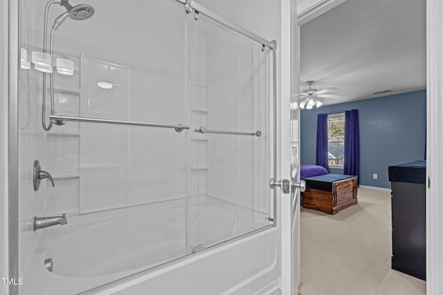 ensuite bathroom with enclosed tub / shower combo, connected bathroom, baseboards, and ceiling fan