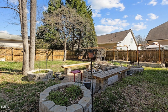 view of yard featuring a garden and fence private yard