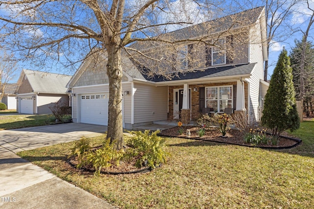 view of front of property with driveway, an attached garage, and a front yard