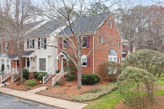 view of front of property with brick siding