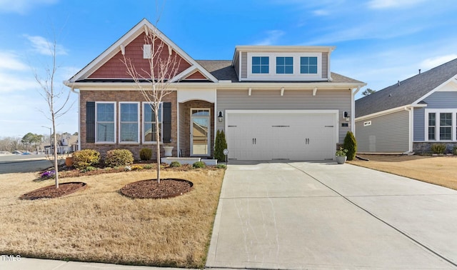 craftsman-style home featuring driveway and a garage