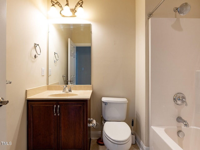 full bathroom with toilet, vanity, baseboards, and washtub / shower combination