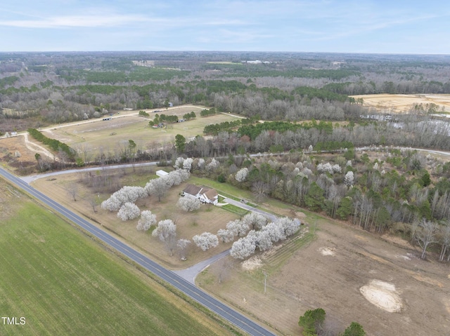 birds eye view of property featuring a rural view