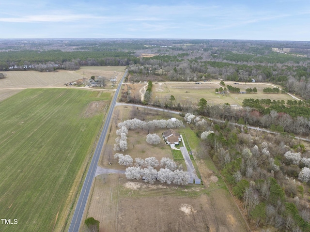 birds eye view of property with a rural view