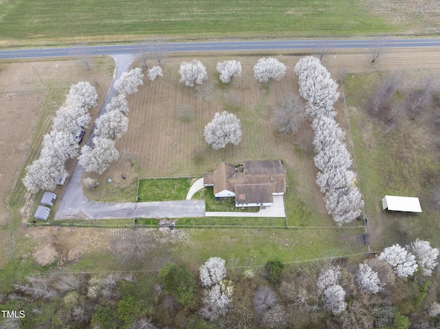 birds eye view of property featuring a rural view