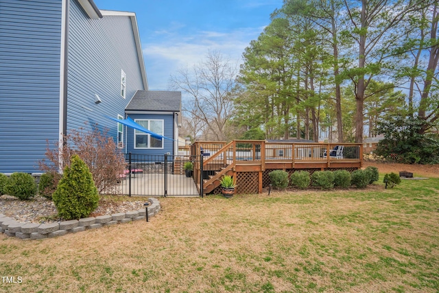 view of yard with a wooden deck