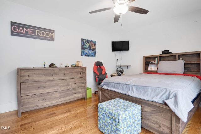 bedroom featuring ceiling fan and wood finished floors