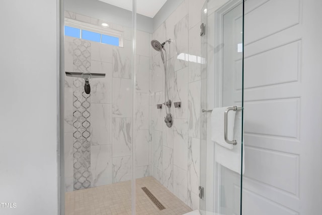 full bath with a shower stall