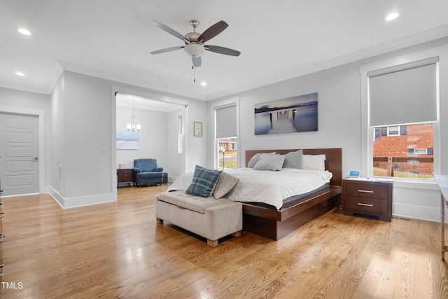 bedroom featuring light wood finished floors, crown molding, baseboards, recessed lighting, and ceiling fan with notable chandelier